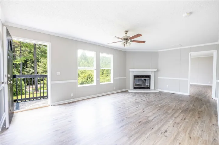 New paint, flooring, fixtures. Fireplace is Decorative