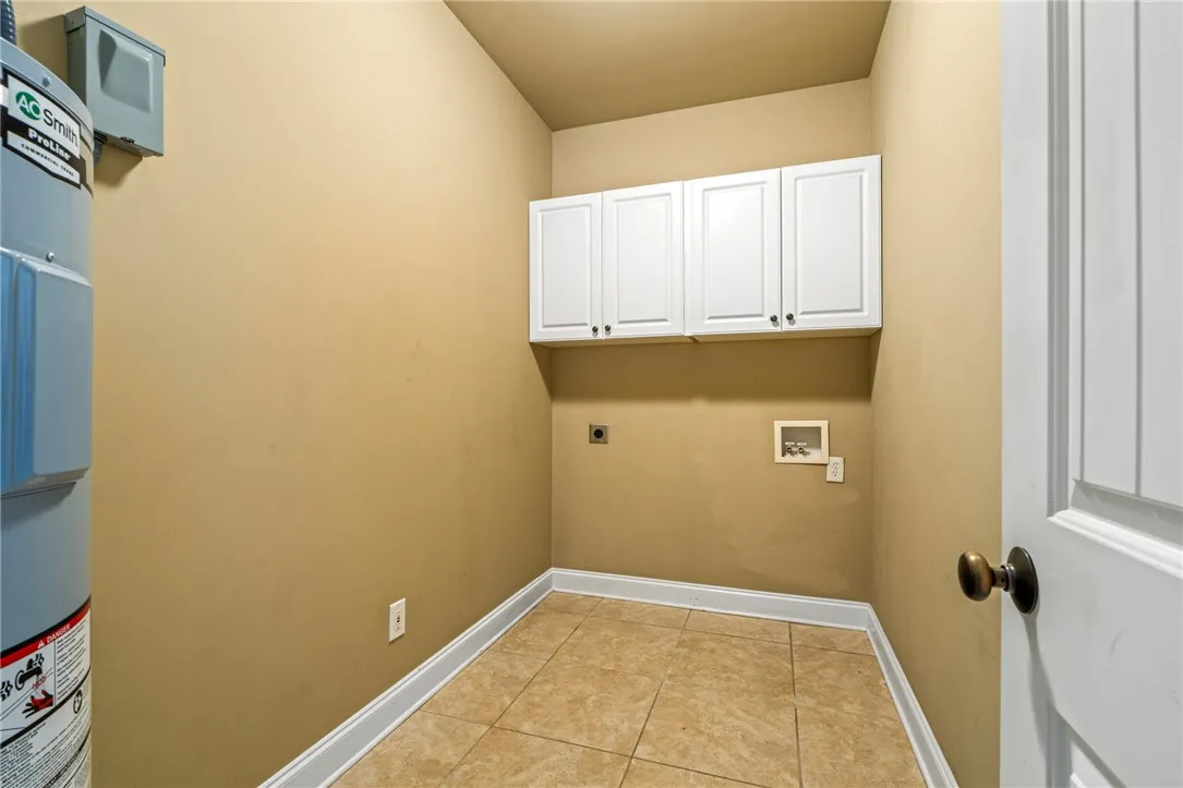 Generous sized laundry room.