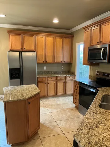 Spacious kitchen with extra cabinets and pantry