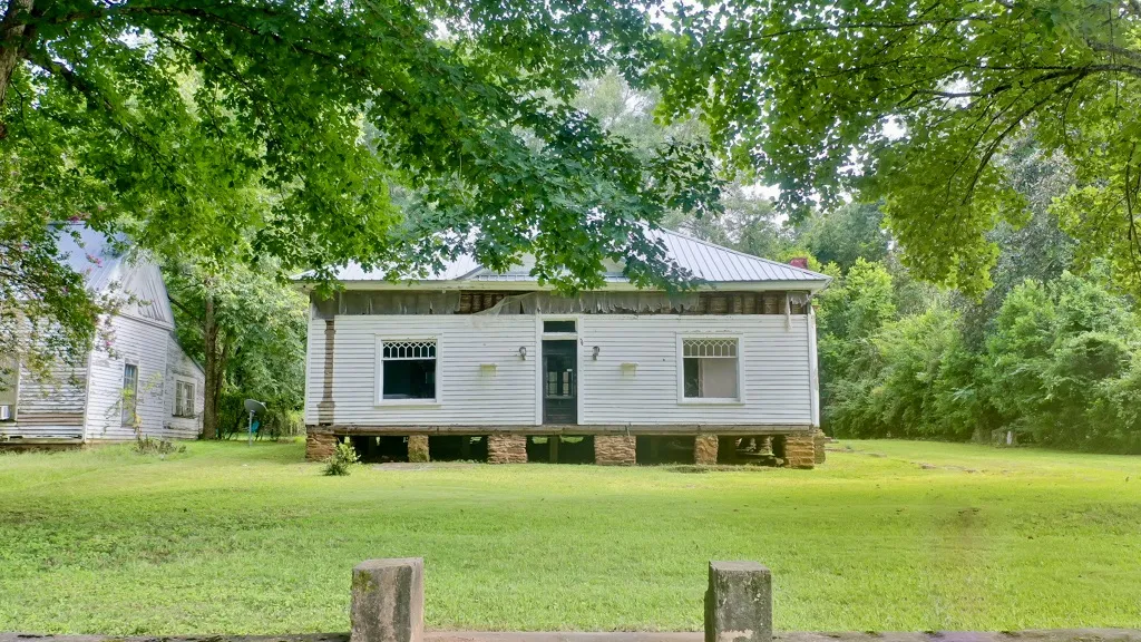 This is a front view after the porch has been removed.