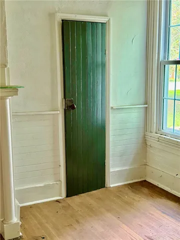 A closet door in the third bedroom.
