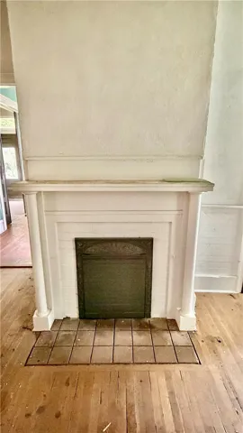 This fireplace is in the third bedroom.  Please note that NONE of the four fireplaces are function based on age.  Ornamental only.