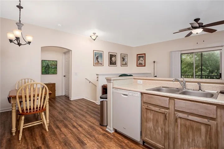 An open concept kitchen transitions into a casual dining area.