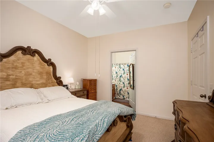 Comfortable bedroom with an attached bath.