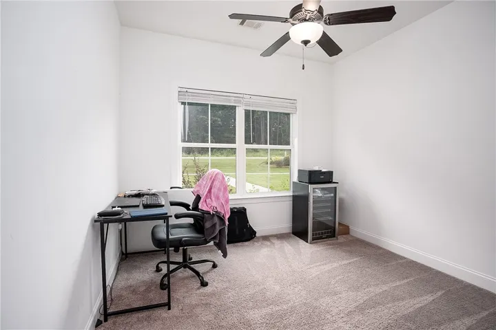 Well-lit room provides a flexible space for an office, study.
 or guest bedroom.