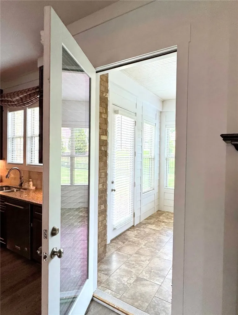 Entry to the sunroom from the kitchen/living room