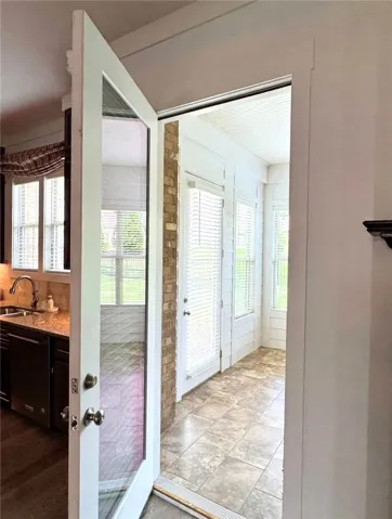 Entry to the sunroom from the kitchen/living room