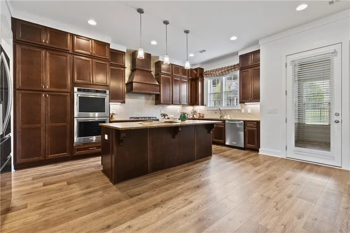 Beautiful cabinetry with so much storage and lots of lighting