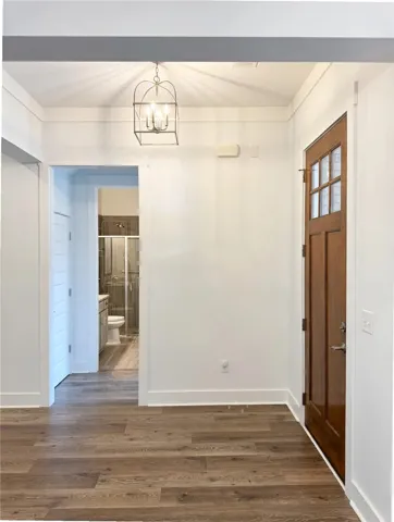 Right side of the home, view of hall bath adjacent to the front bedroom