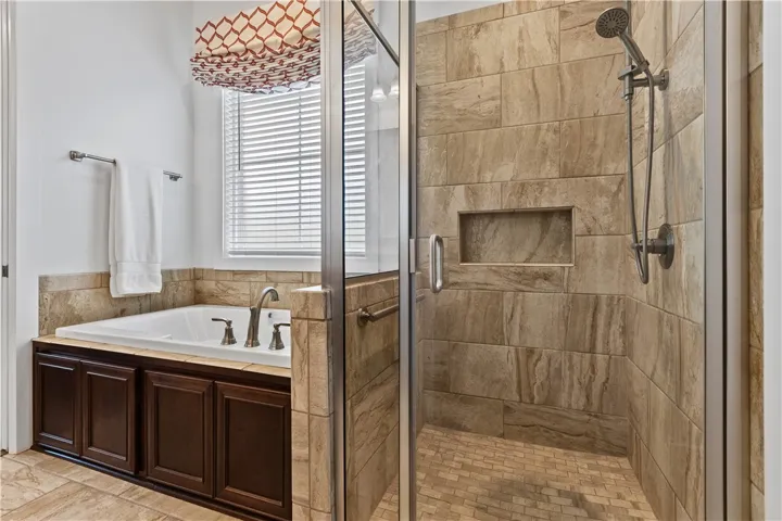 Zero entry shower with room for a bench seat, separate tub
