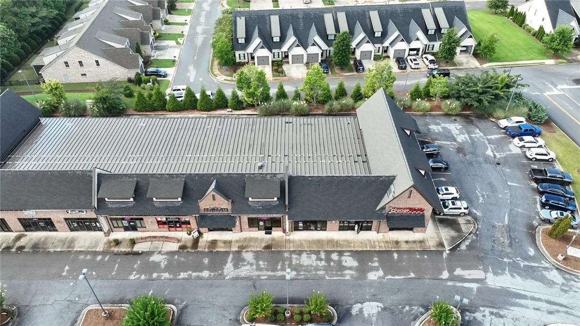 An aerial perspective shows variety of shopping available nearby.