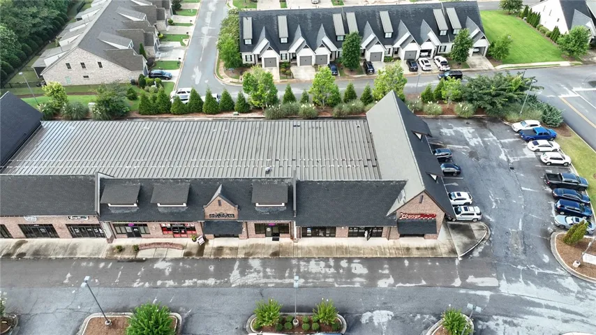 An aerial perspective shows variety of shopping available nearby.