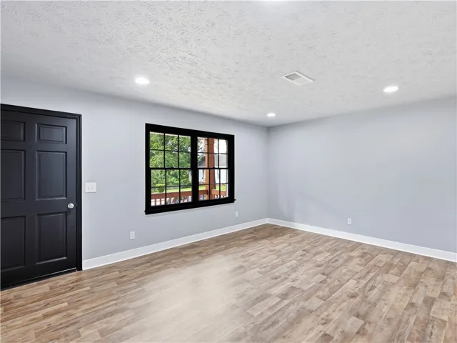 Living space looking at the front window.