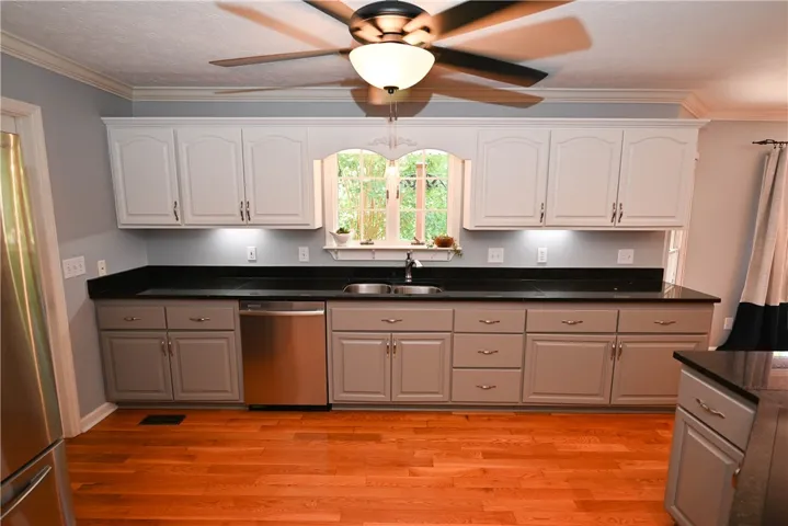 Stainless steel appliances. Granite countertops.