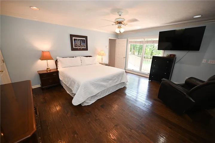 Private primary suite with huge windows offering lake views!