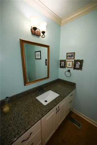 Powder room off of foyer.