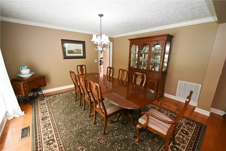 Formal dining room. Door in background leads to kitchen.