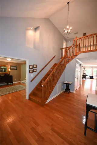 2-story foyer. (Back left: formal living room. Back right: great room.)
