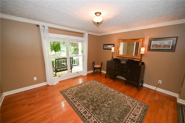 Formal living room. (Open to formal dining.)