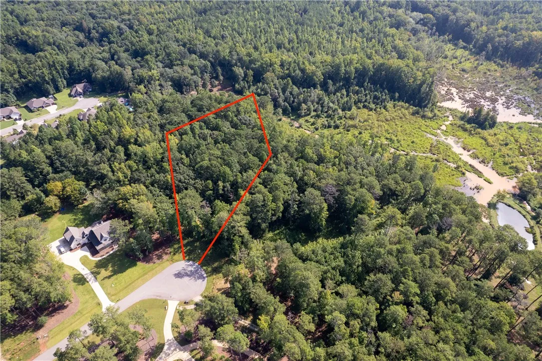 Red lines are estimated property lines, please view plat and photo from tax map for accurate property line details