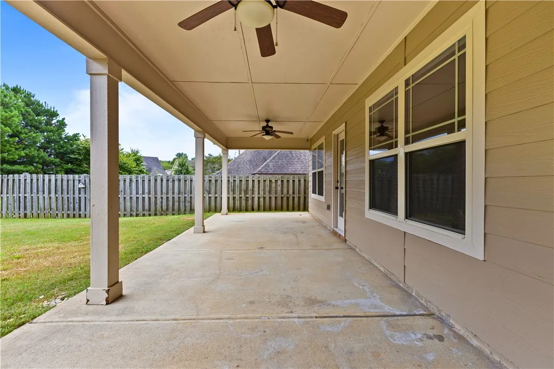 Large covered patio is ready for you to create a relaxing outdoor living area