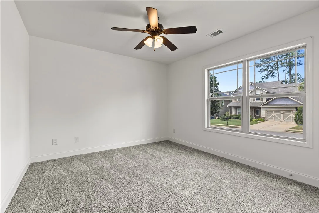 New carpet and paint in this second downstairs bedroom