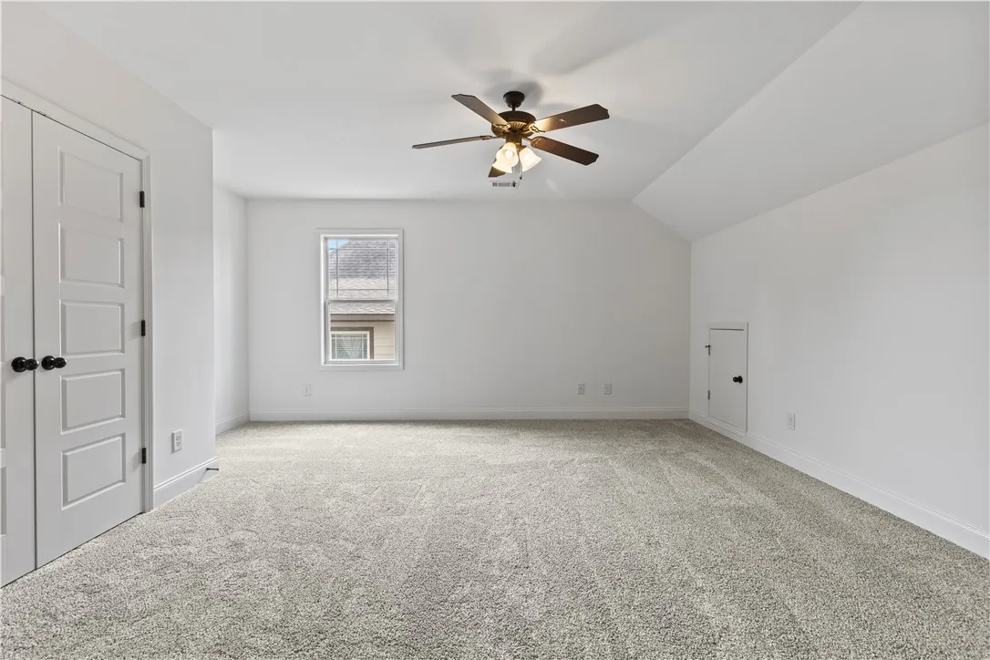 Bedroom 4 is a very spacious room that is also perfect other uses such as a media room, playroom, etc. There is attic access in this room.