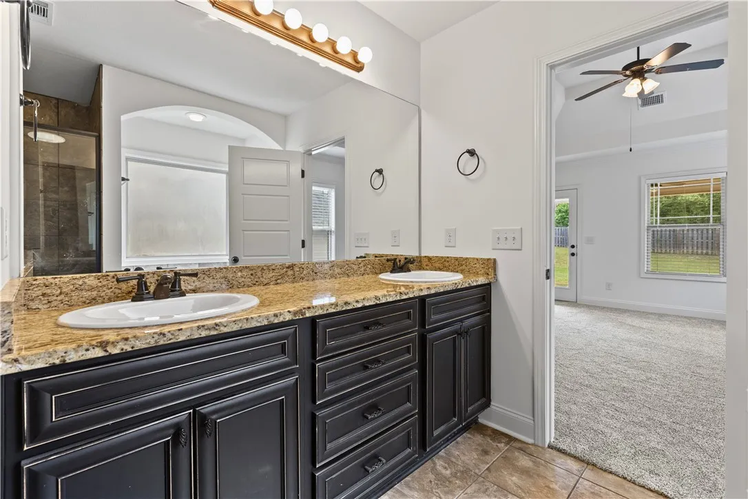 Double vanities,  granite counters, great natural light