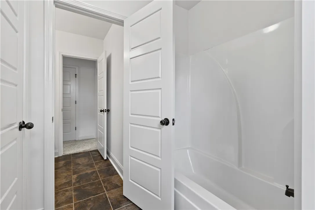 Upstairs full bath; shower/tub and commode is separate from the vanity area