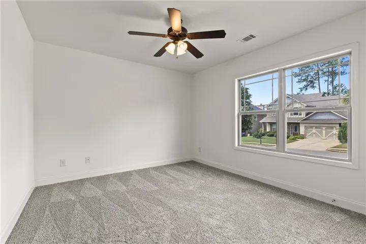 New carpet and paint in this second downstairs bedroom