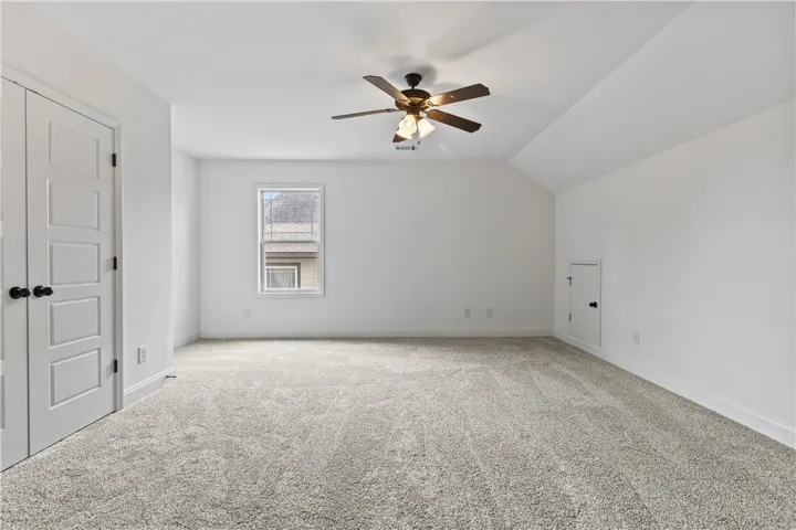 Bedroom 4 is a very spacious room that is also perfect other uses such as a media room, playroom, etc. There is attic access in this room.