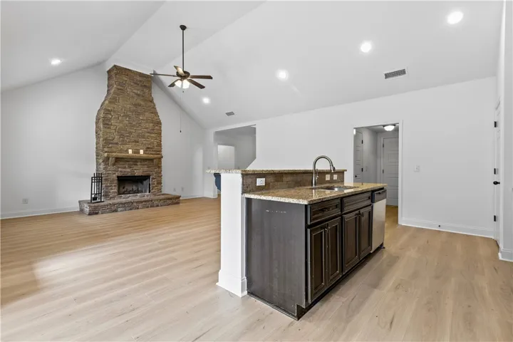 Open concept great room and kitchen, granite counters, stainless steel appliances