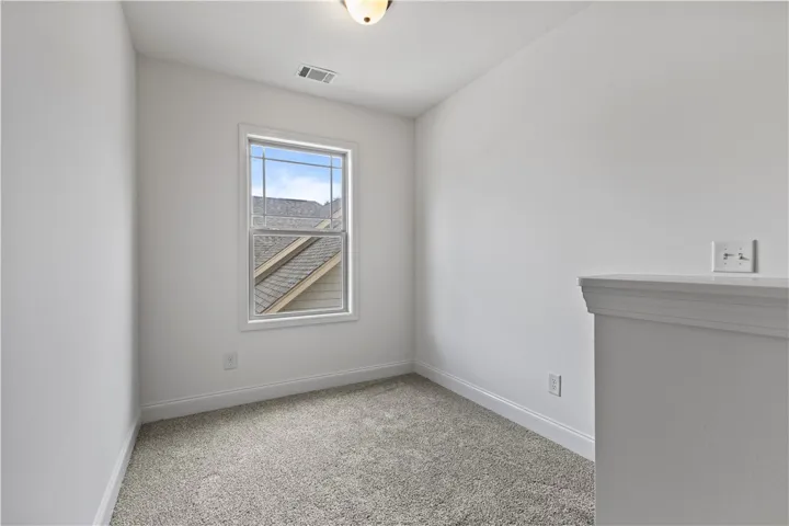 Upstairs landing, two bathrooms and one full bath