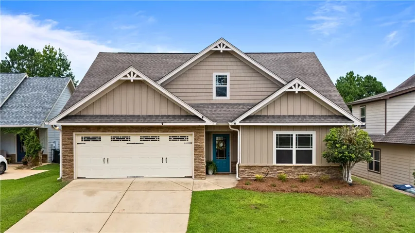 4 beds/3 baths, new interior paint and flooring throughout. Freshly painted front door and new landscaping in front