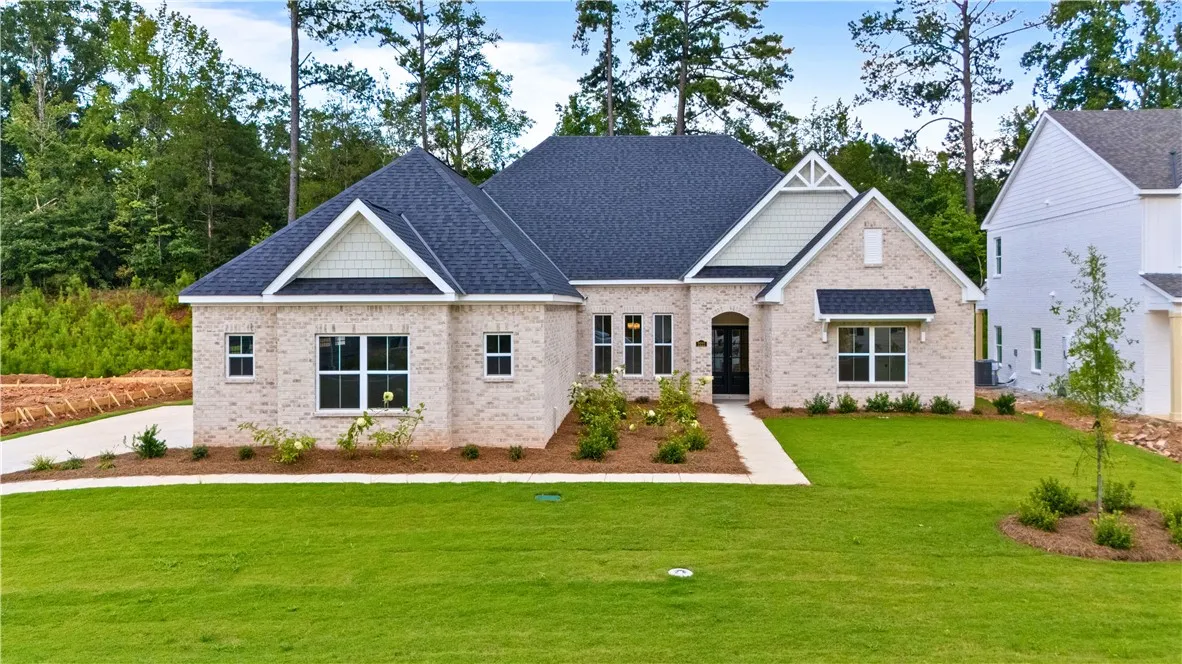 Gorgeous brick home in Hidden Lakes Subdivision.
