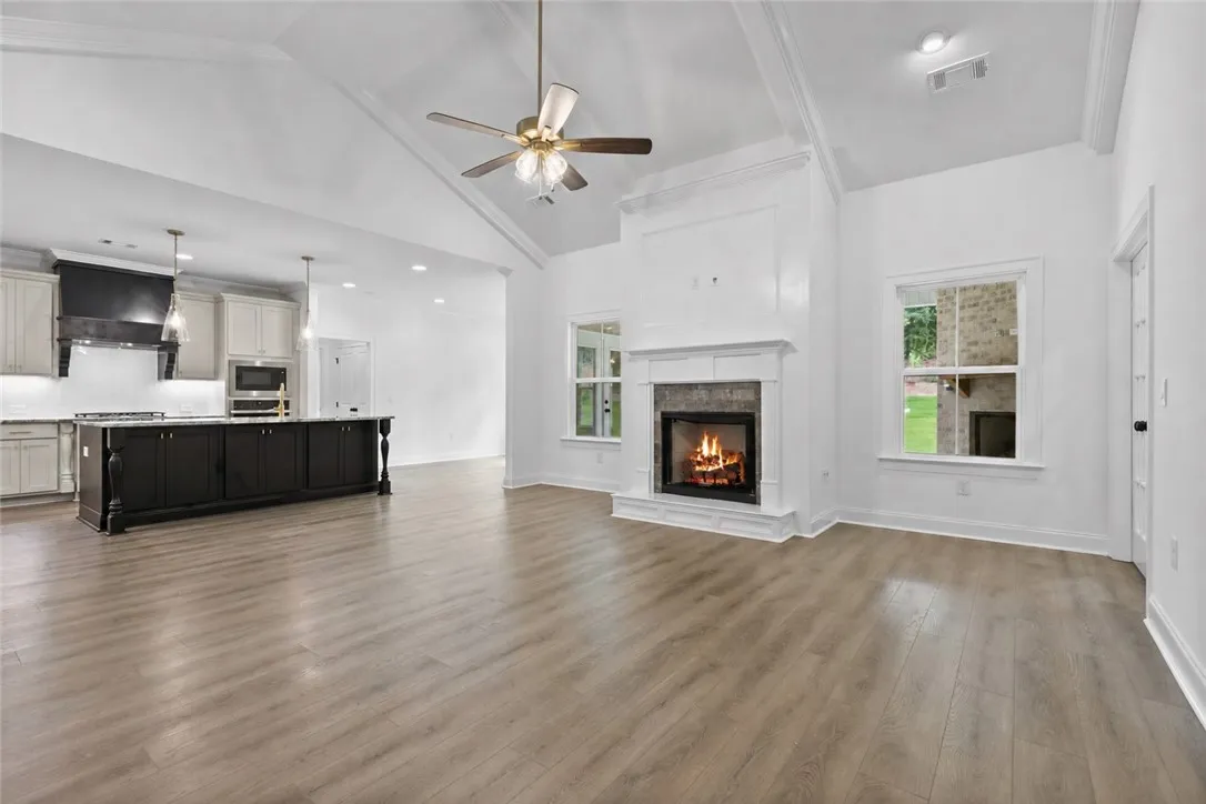 Just at the end of the entryway is the open and expansive living room/kitchen combo.