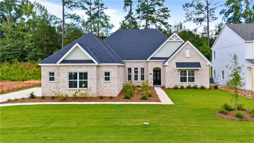 Gorgeous brick home in Hidden Lakes Subdivision.
