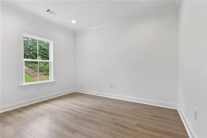 Just off the living room, the office does have doors for privacy but could also be used as a playroom or extra sleeping space.