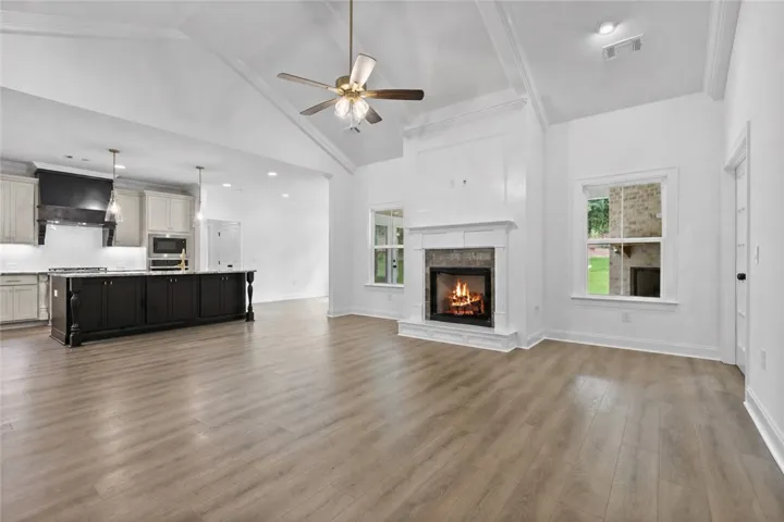 Just at the end of the entryway is the open and expansive living room/kitchen combo.