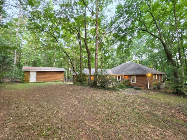 Backyard view of house & workshop
