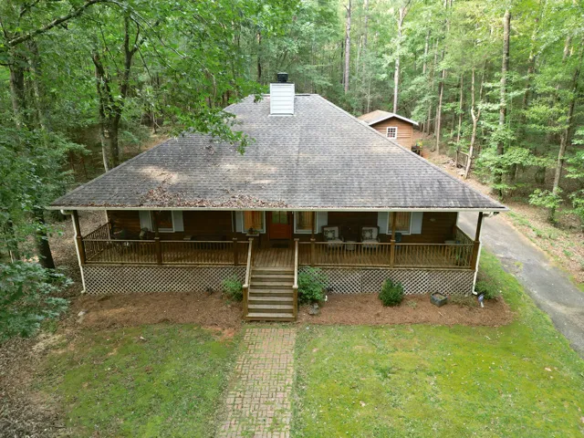 Aerial view of house & workshop beyond