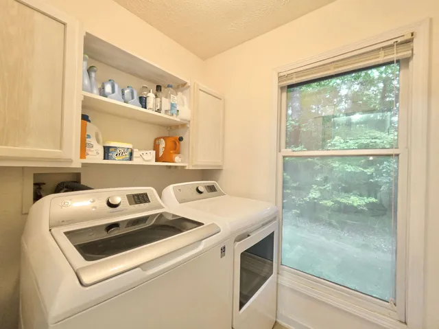 A peek at the Laundry Room on the way to the Primary Suite
