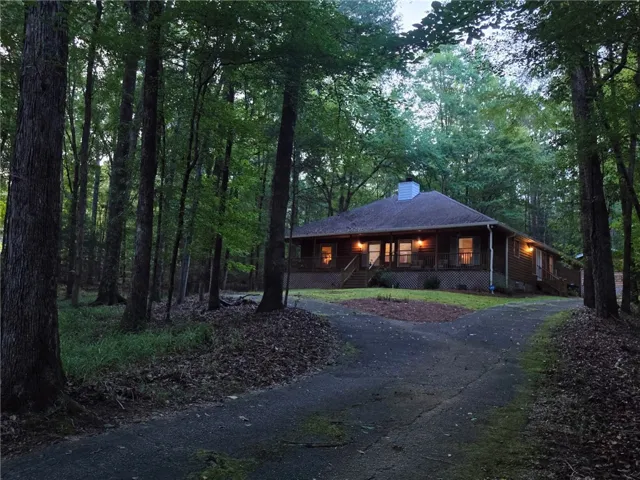 Welcome to 675 Jennifer Drive--your cabin in the woods on 2 acres in Auburn!