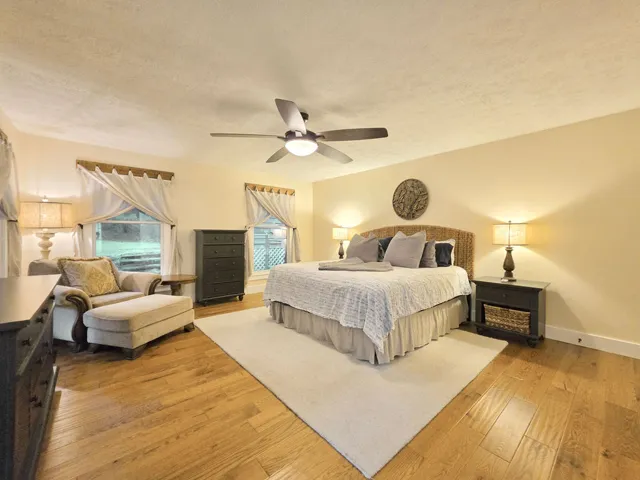 Spacious Primary Suite with handsome hardwood floors!