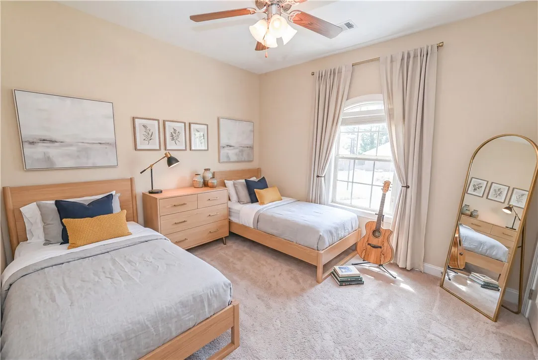 DIGITALLY STAGED Bedroom 2 
On the opposite end of the house lies a roomy second bedroom