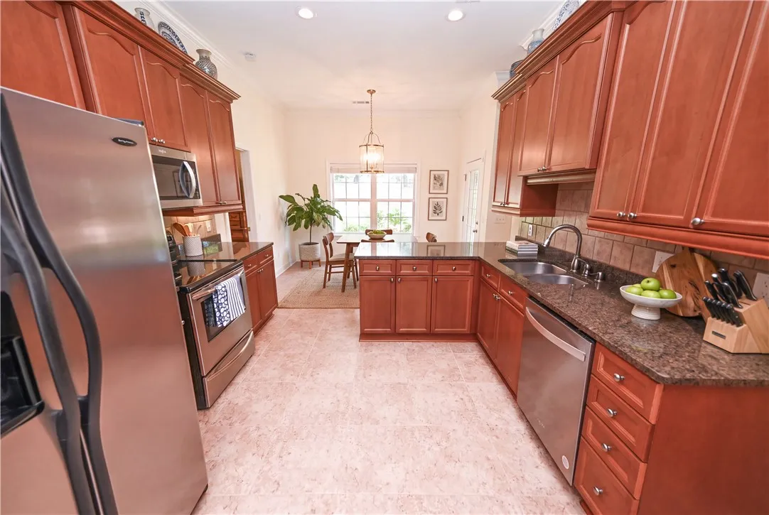 DIGITALLY STAGED Kitchen
Stepping into the kitchen you'll find granite countertops, lots of cabinet space, and stainless steel appliances.