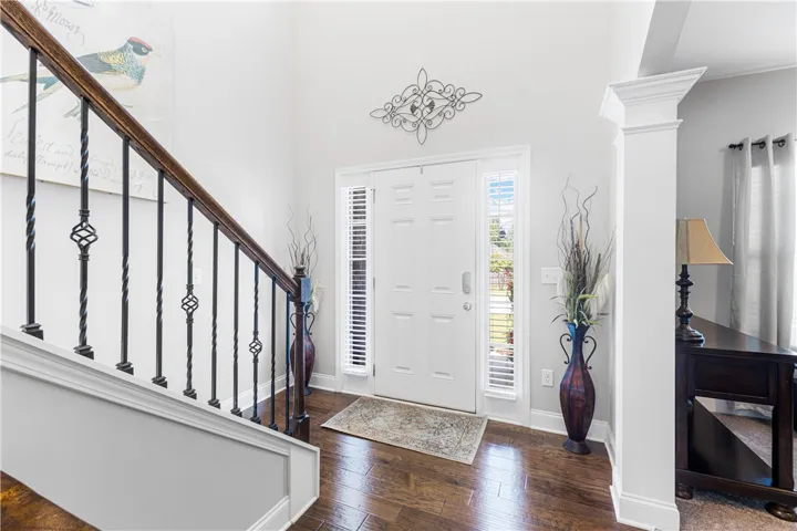 High ceilings and rich hardwood flooring welcome visitors into this elegant entrance​​‌​​​​‌​​‌‌​‌‌​​​‌‌​‌​‌​‌​​​‌​​ foyer.