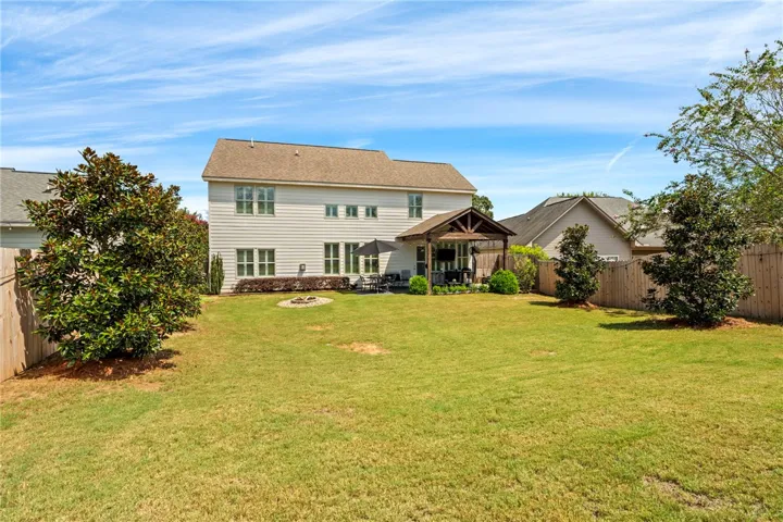 Upgraded landscaping and updated privacy fence