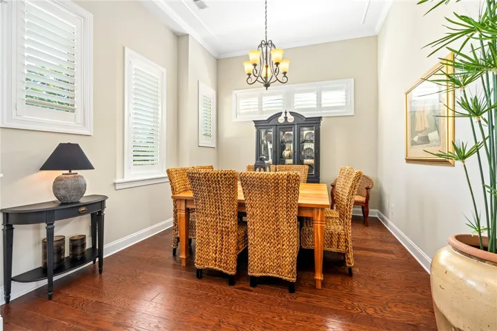 Formal dining room with grand ceilings and beautiful trim work