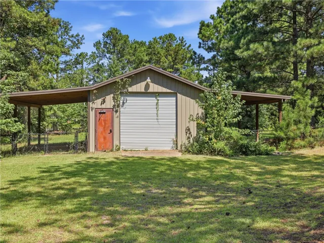 Pole Barn with garage & power, makes a wonderful workshop!
